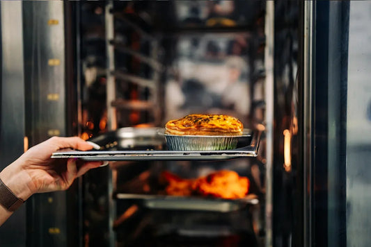 Frozen pies baking in a commercial convection oven for consistent result