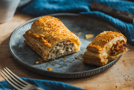 Close-up of pork shoulder showing marbling for juicy sausage rolls.