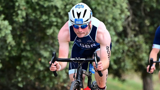 Image of triathlete Jack Mudd-Bowes riding his bike at the European Championships in Madrid