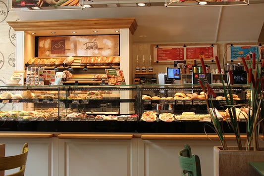 Farm shop counter showcasing a variety of handheld pastries