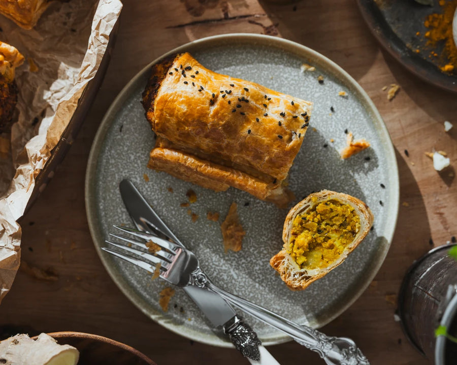 Bombay Potato Roll cut open showing curried potato filling