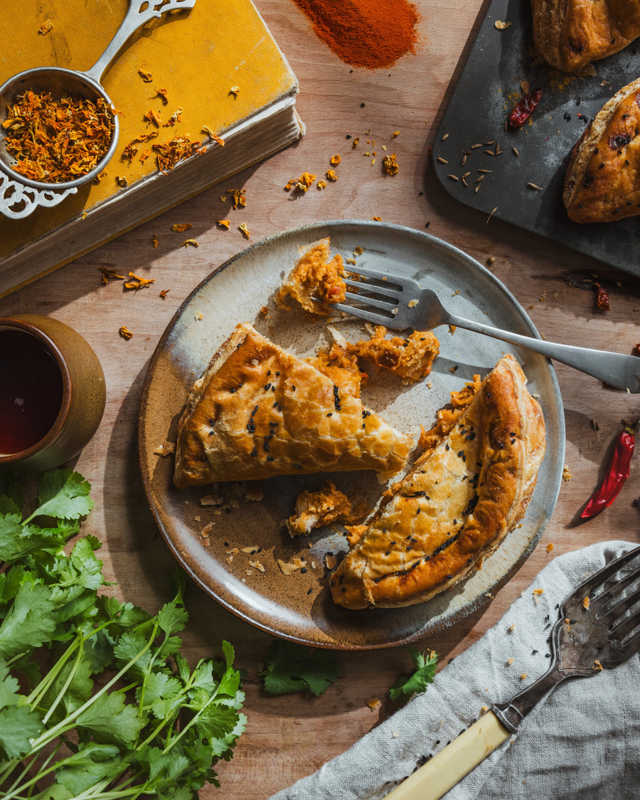Chicken Tikka Pasty cut open showing spiced chicken curry filling