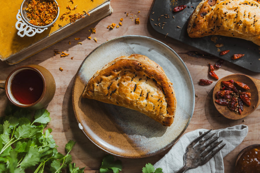 Chicken Tikka Pasty in golden puff pastry with black onion seeds